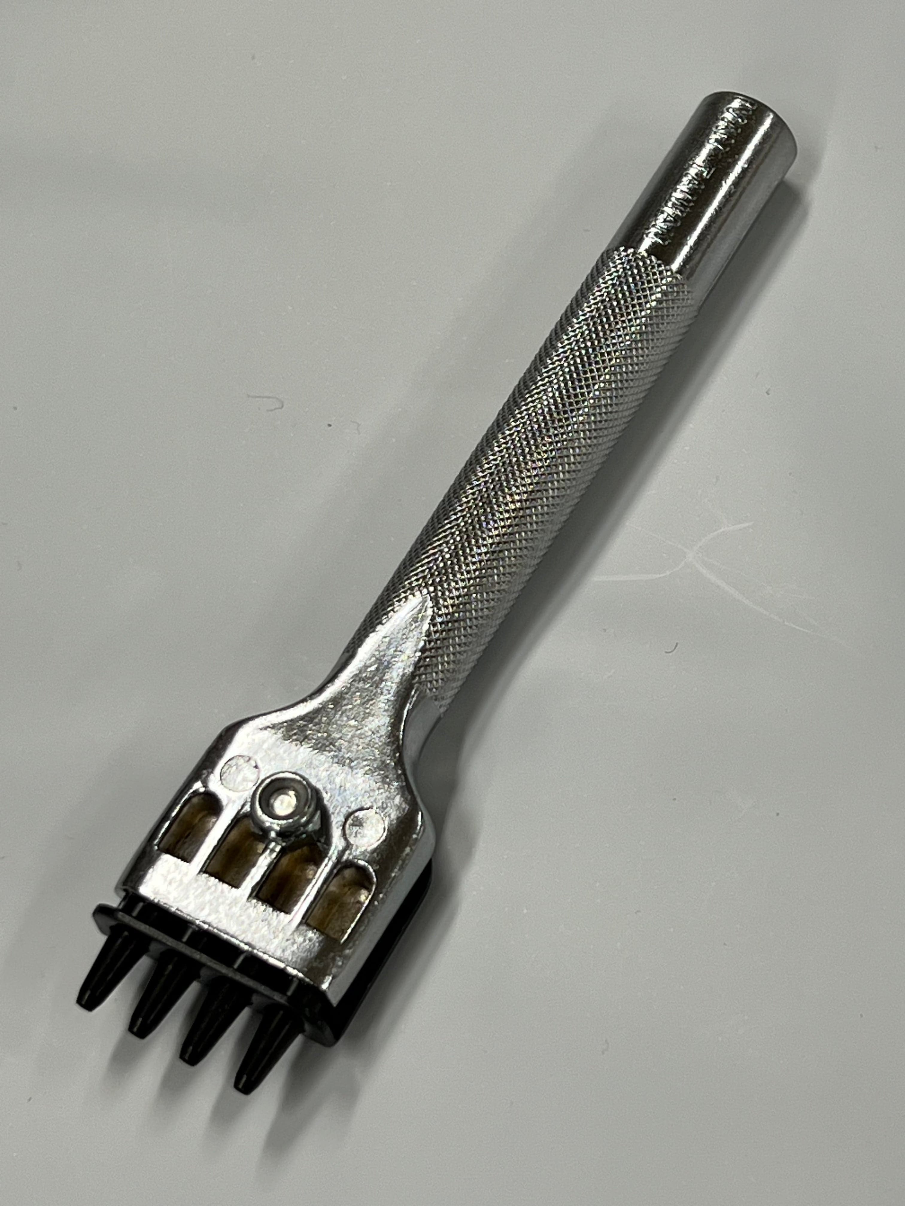 Perforadora 4 en 1